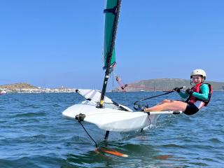 Flying with the Nikki foiling dinghy
